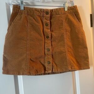 Altar'd State Button-Front Mini Skirt in Warm Brown